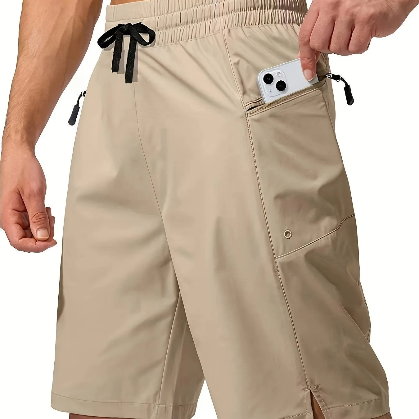 Man wearing straight cut quick-dry polyester beach shorts in a solid colour.