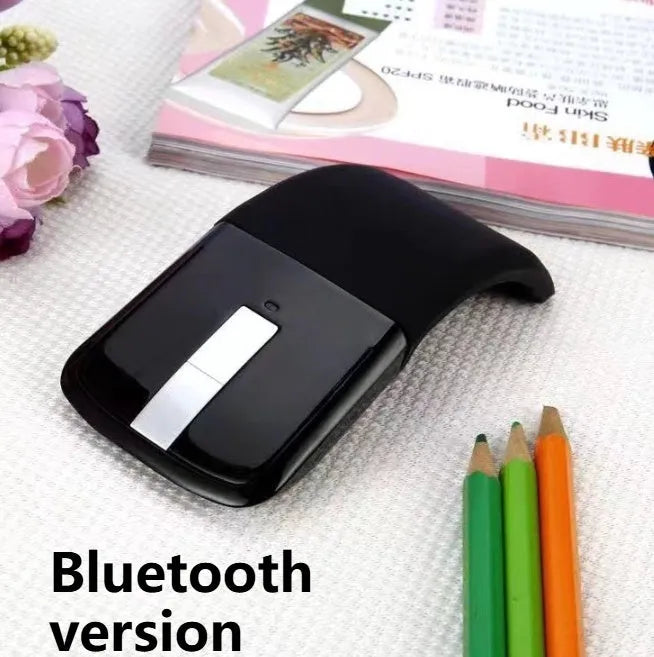 Folding Bluetooth wireless mouse shown in both open and closed positions with compact 131.2mm design
