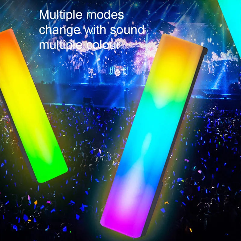 Black and white 3D RGB voice-activated music rhythm ambiance lamp on a tabletop.