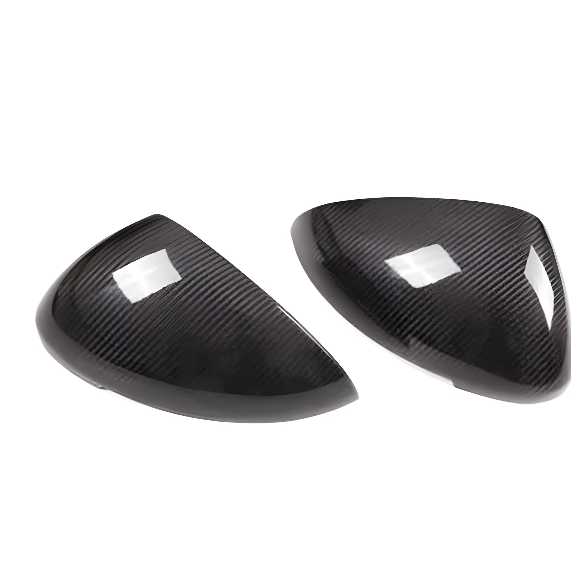 Black true carbon fibre rearview mirror cover for Porsche Macan on a white background
