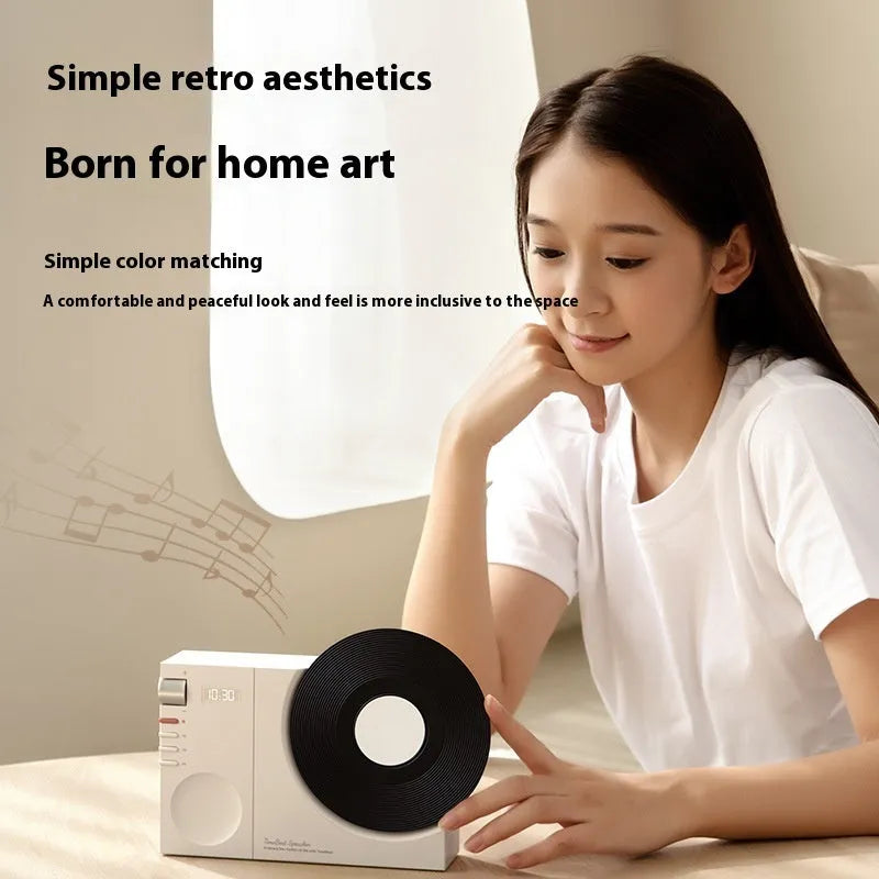 Mini Bluetooth portable speaker in Obsidian Black, Ivory White, Coral Pink or Plum Green colours with USB charging port