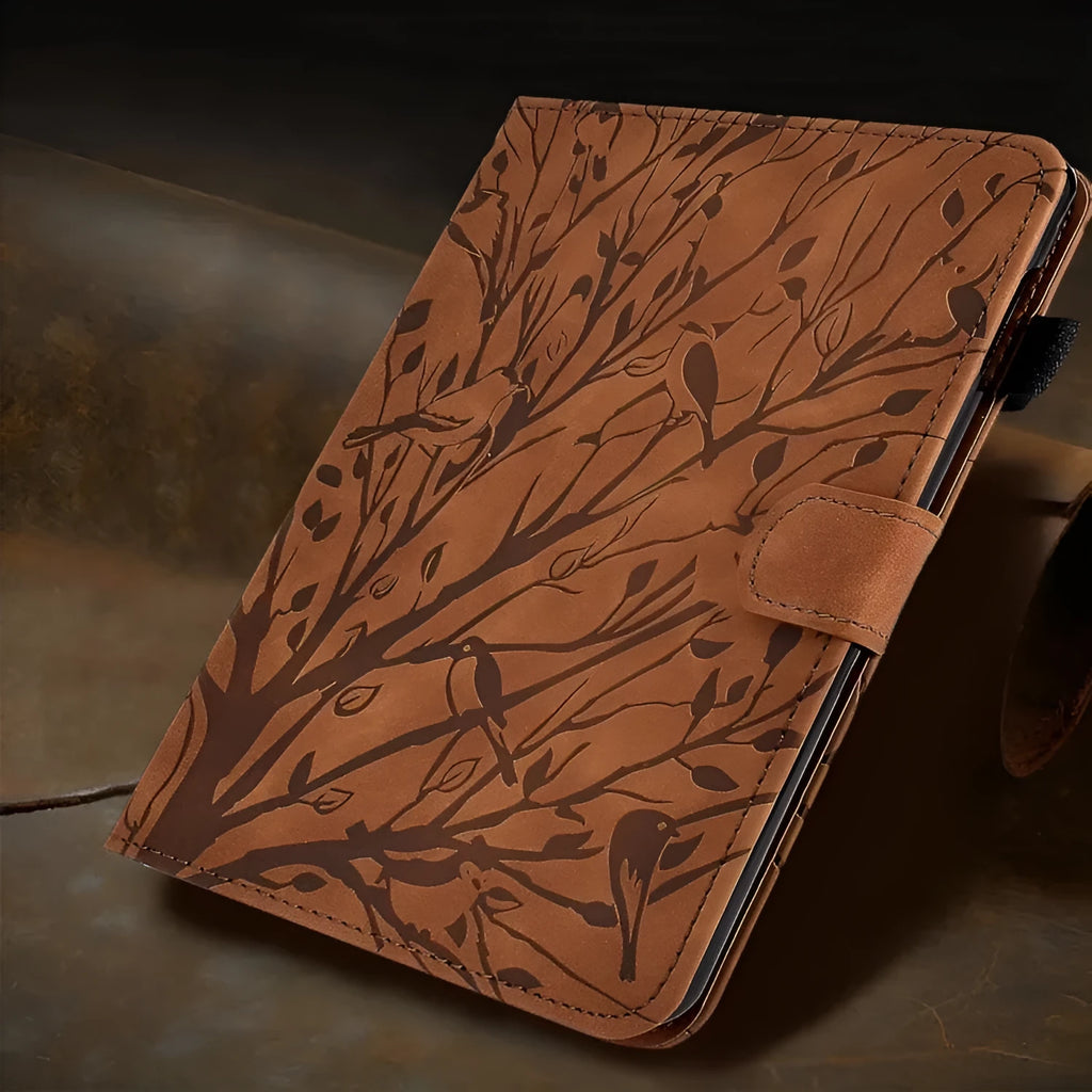 Imitation leather tablet protective case with integrated stand in black colour, shown next to a tablet.