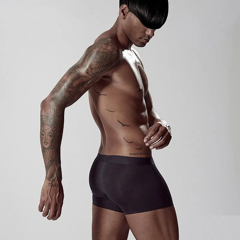 Men's seamless Modal underwear in solid colours showing mid-waist design
