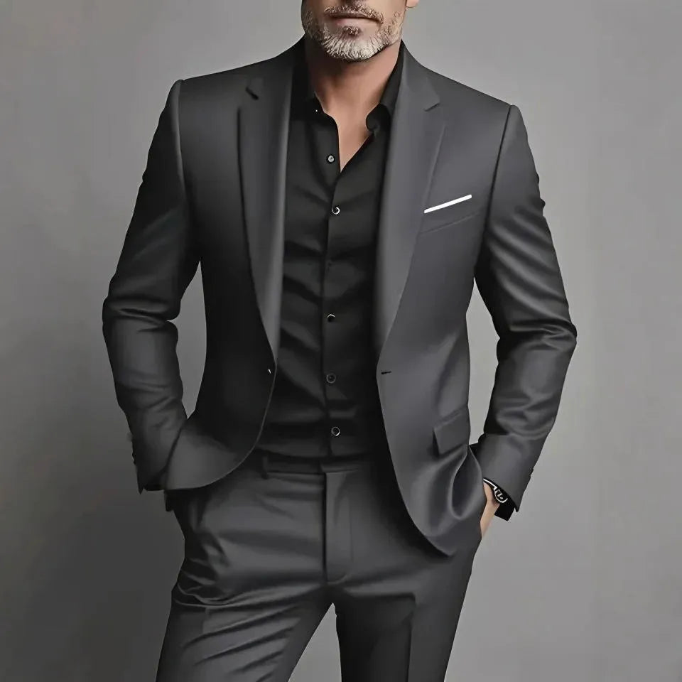 Men's slim fit two-piece suit set in black cotton blend fabric with coat and trousers