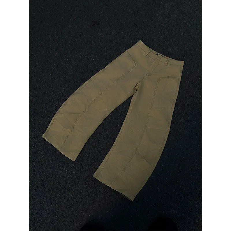 Khaki straight-leg cotton trousers on hanger showing American retro styling