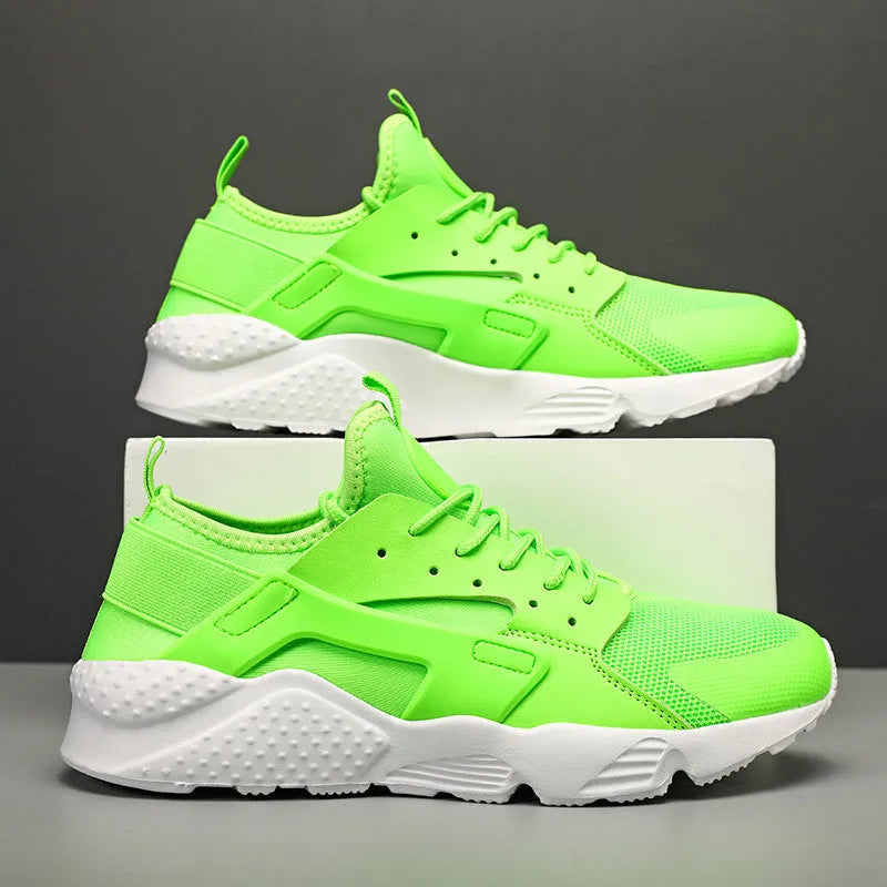 Men's fluorescent casual sneakers with mesh upper, cross shoulder straps and flat sole.