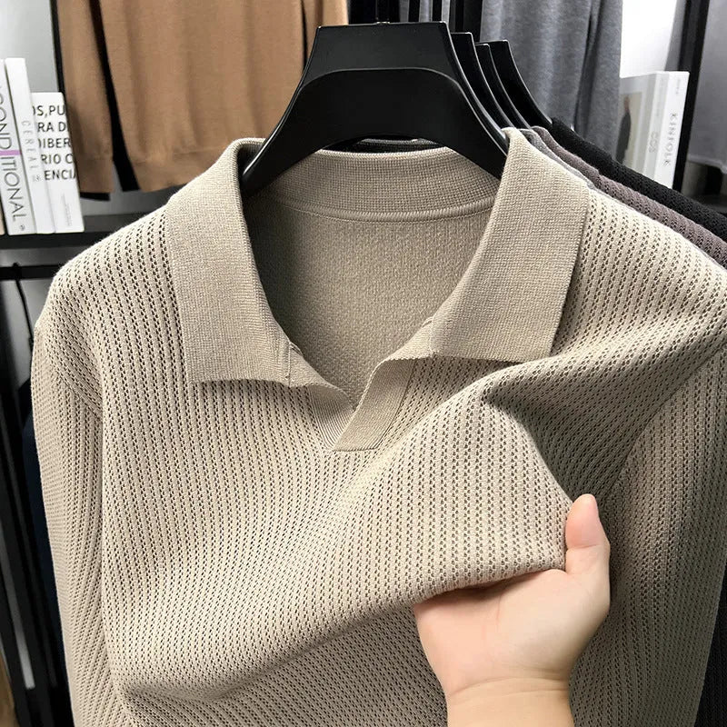 Men's loose fit plain pullover sweater in green, shown on a model for scale.