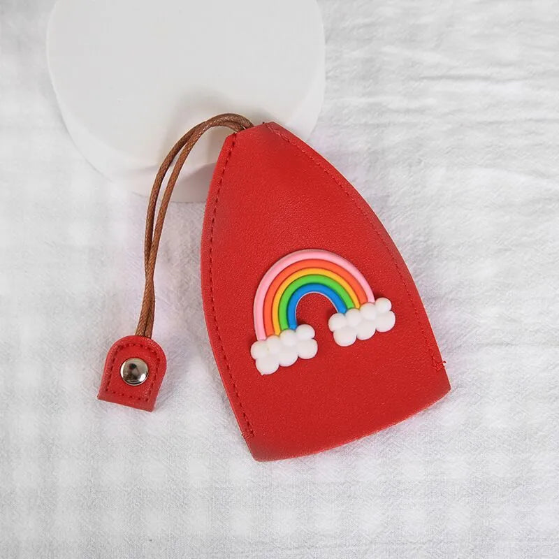 Cartoon pull-out key case in PU leather showing design options including resin fruit and big cartoon animal prints.