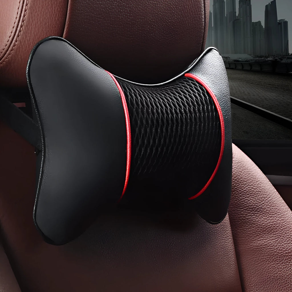 Car headrest neck pillow in black red colour with green leather exterior on a car seat