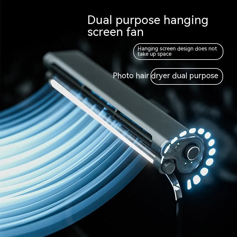 Black bladeless USB fan clipped to laptop screen with integrated lighting lamp showing brushless motor design