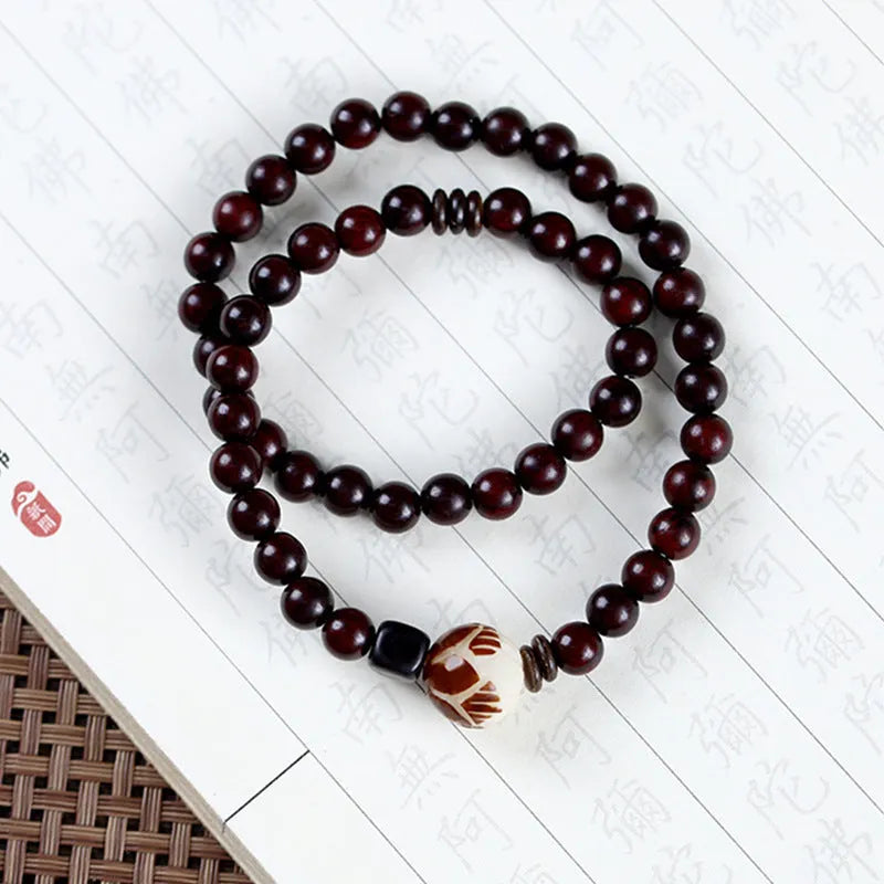 Natural rosewood double-ring bracelet with retro flower design, 10mm size, showing double circle pattern