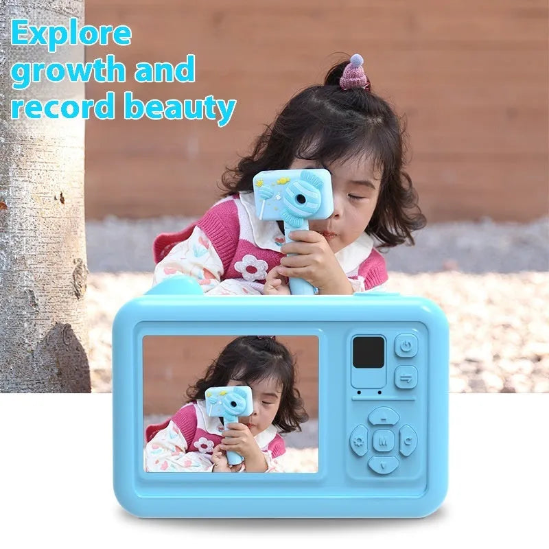 Children's dual camera toy camera in pink lollipop with silicone case and lanyard on a white background