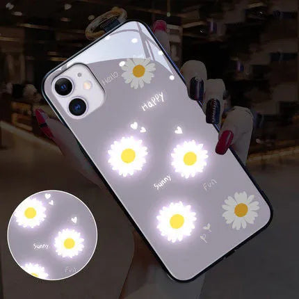 Luminous iPhone case with printed daisy design and voice-activated colour lights on TPU protective shell