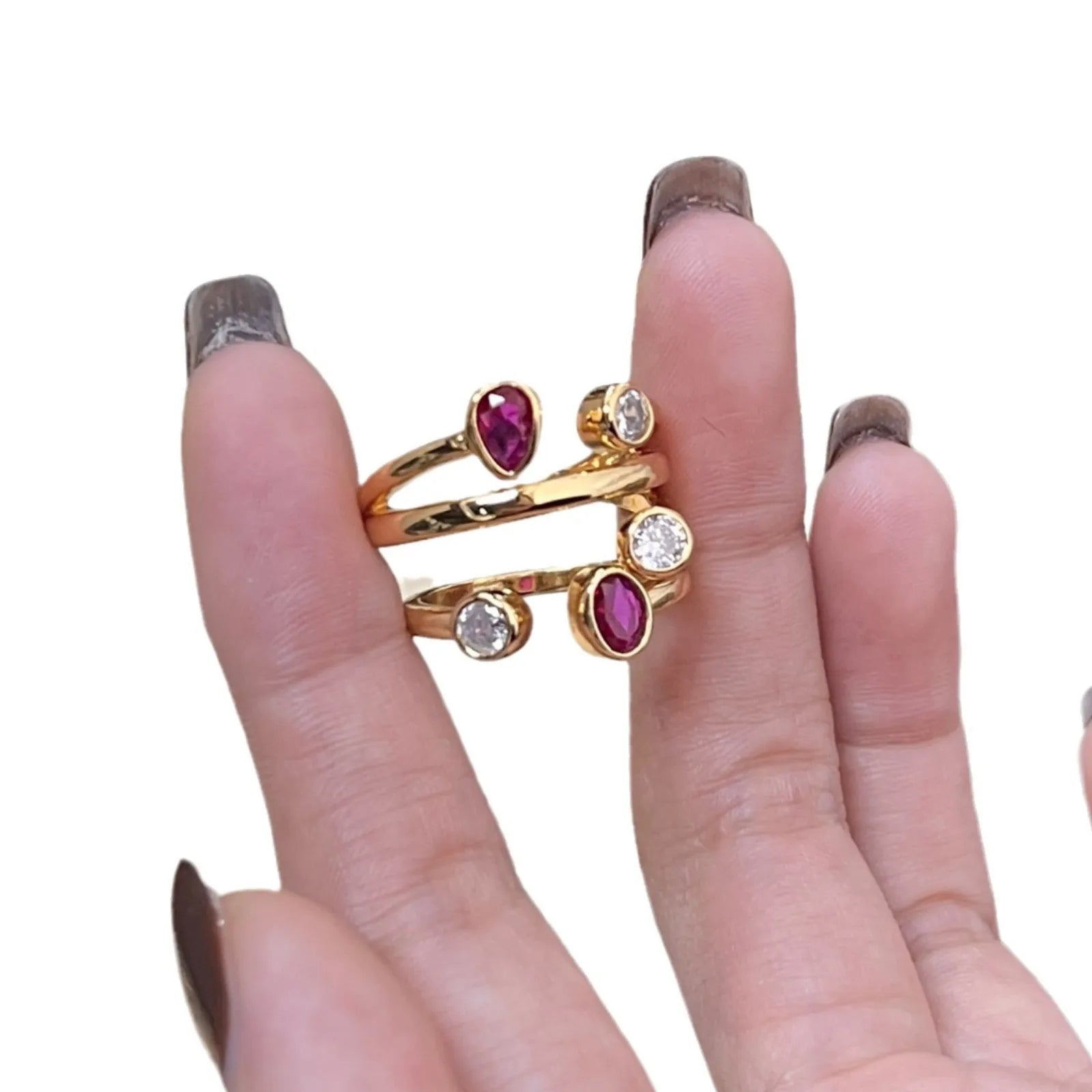 Geometric irregular-shaped ring with double-headed design and diamond accents in two-tone colours