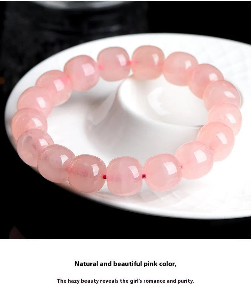 Natural pink crystal barrel-bead bracelet with 8x10mm polished geometry beads