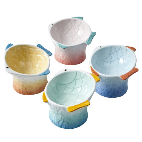 Set of blue ceramic cat feeder bowls in a fish shape with a 15-degree tilt angle.