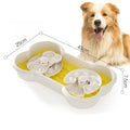 Large green dog slow feeder bowl with three rotating trays showing wave and groove patterns