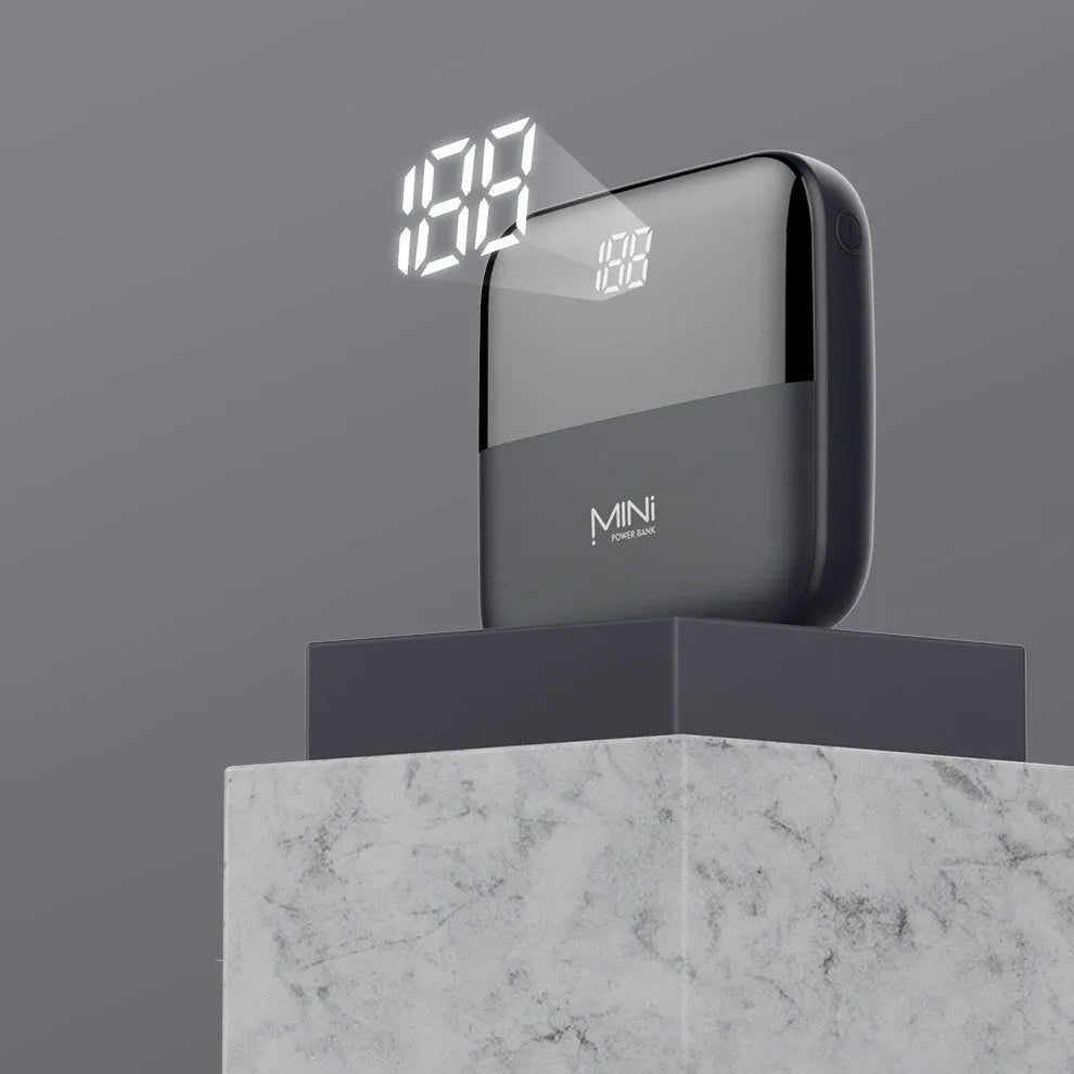 10000mAh portable power bank with digital display showing charge percentage