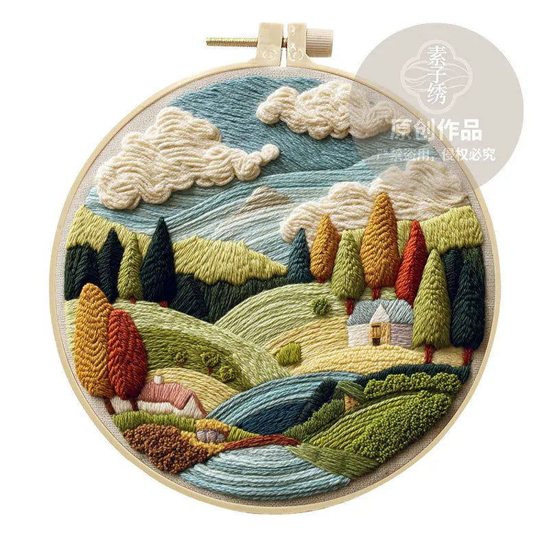 Embroidery DIY kit with printed landscape fabric, embroidery threads, needles, and frame for handmade cloth art