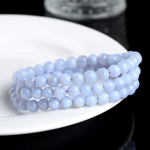 Natural blue agate bracelet with multi-circle patterns and approximately 86 beads measuring 6-6.8mm diameter