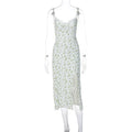 Women's long summer dress with lace flower print, suspender straps, and a high-leg slit.