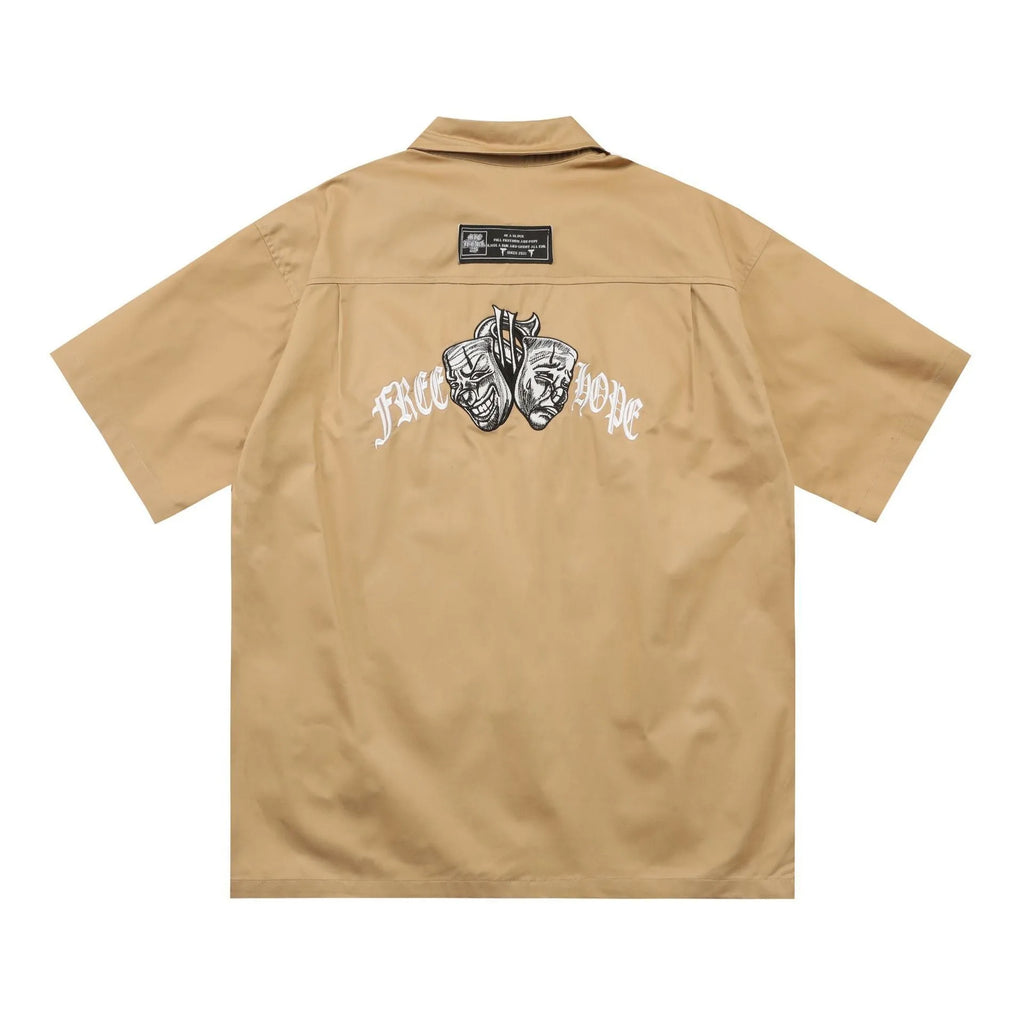 Men's plus size loose fit cotton blend work shirt with half sleeves and embroidered design