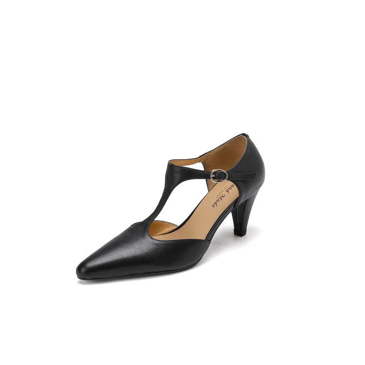 Brown retro women's T-strap sandals with a closed round toe, buckle fastening, and a chunky block heel.