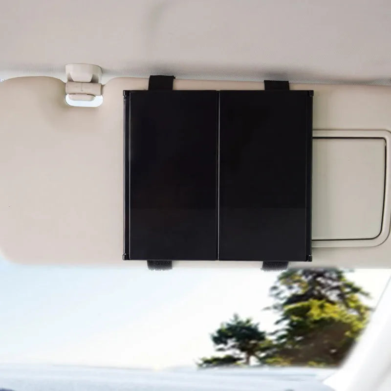 Silver folding car visor makeup mirror shown open and closed