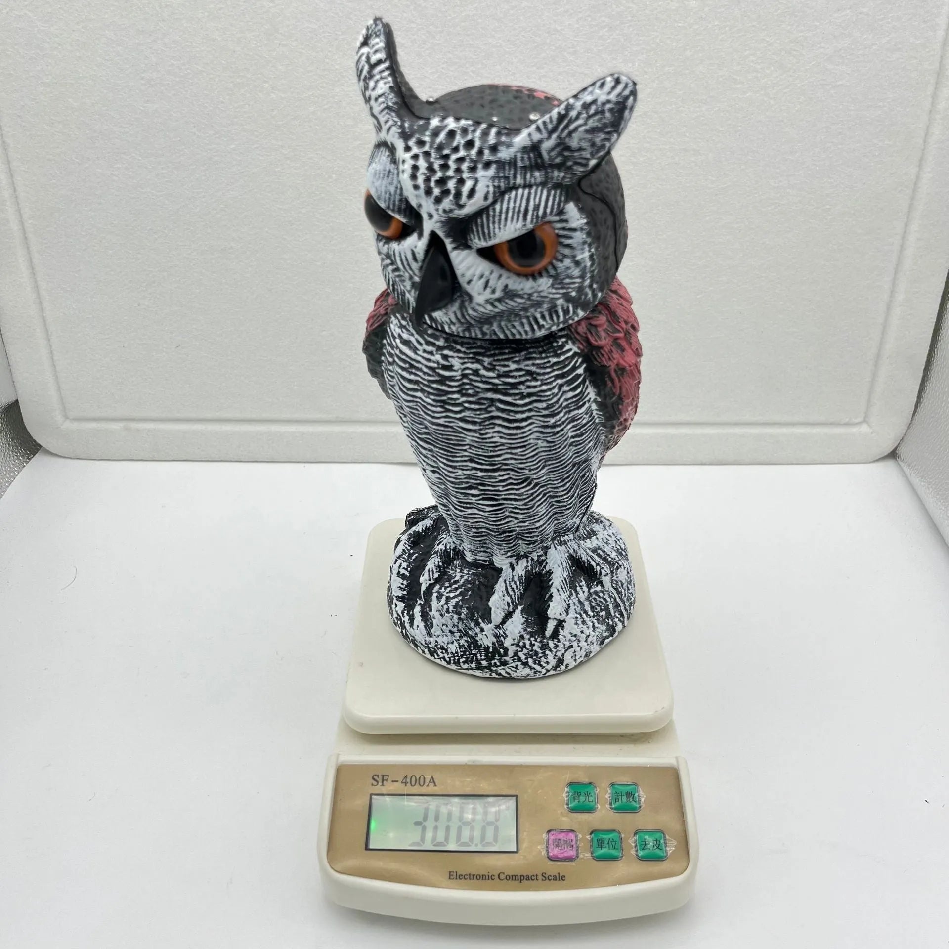 Artificial plastic owl bird scare ornament with moveable head for outdoor garden pest control