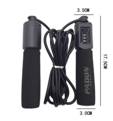 A black skipping rope with foam sponge handles on a plain background.