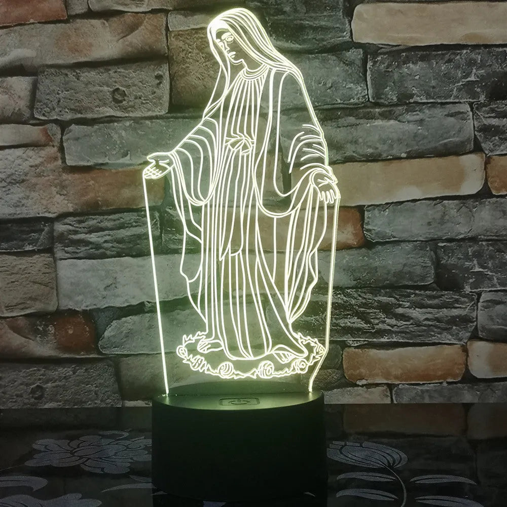 3D LED night light showing illuminated blue dual-ring pattern on acrylic plate with black ABS base.