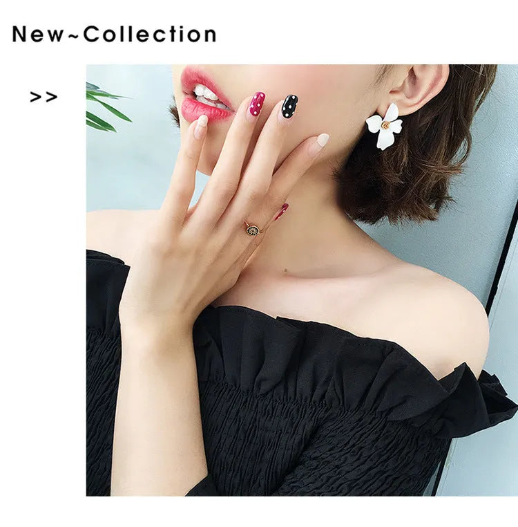 Flower stud earrings for women in white or pink with electroplated alloy construction