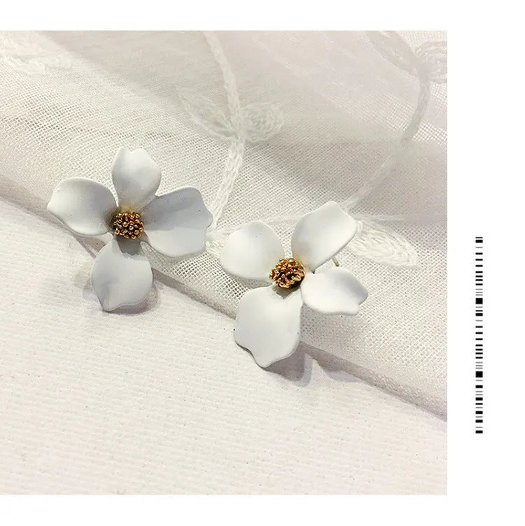 Flower stud earrings for women in white or pink with electroplated alloy construction