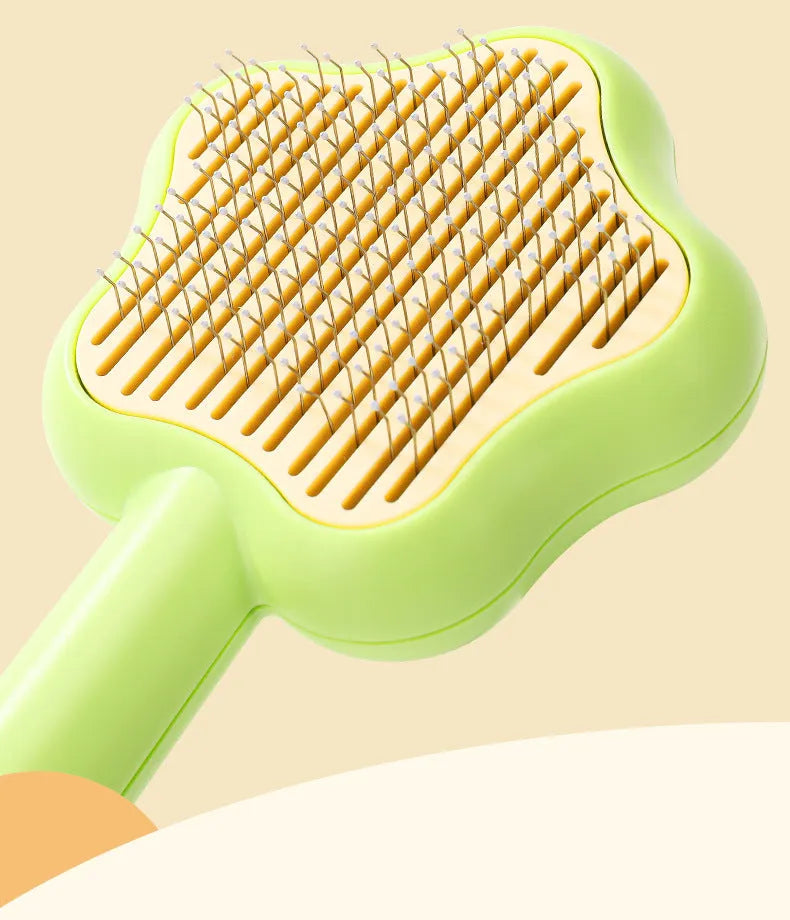Self-cleaning cat comb magic wand with stainless steel needle teeth in green or yellow colour options