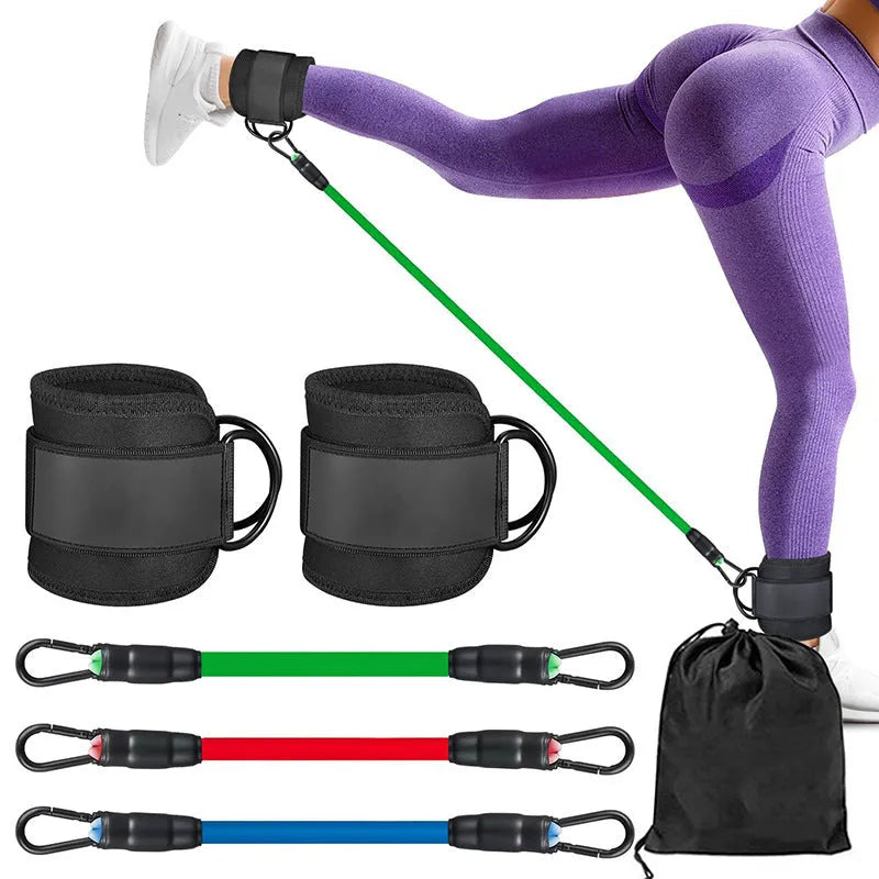 Three TPE resistance bands in different colours with foot loops and storage bag for leg and hip exercises.