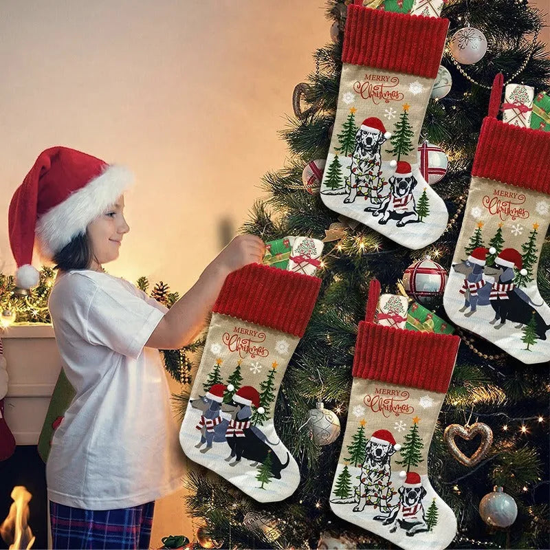 Pet Christmas tree hanging sock with fireplace design in cloth material measuring 46cm by 28cm