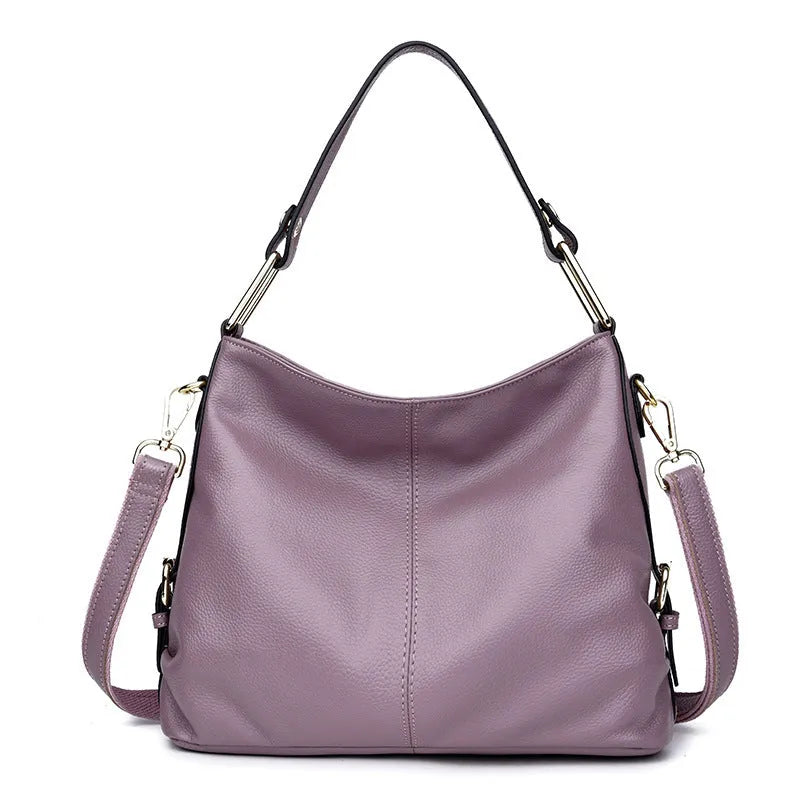 Genuine leather vertical square crossbody bag showing internal phone and document pockets