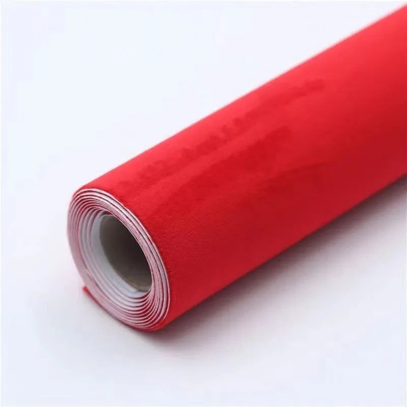 Self-adhesive leather suede sheet roll in multiple colour swatches showing black, brown, blue, and red.