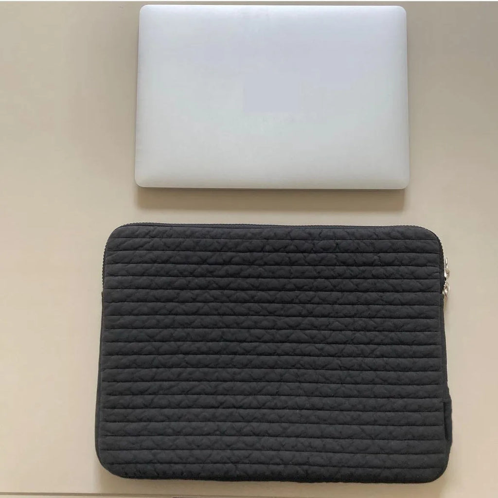 Black and white anti-seismic cotton cloth laptop bag for tablets, shown with a coin pocket.