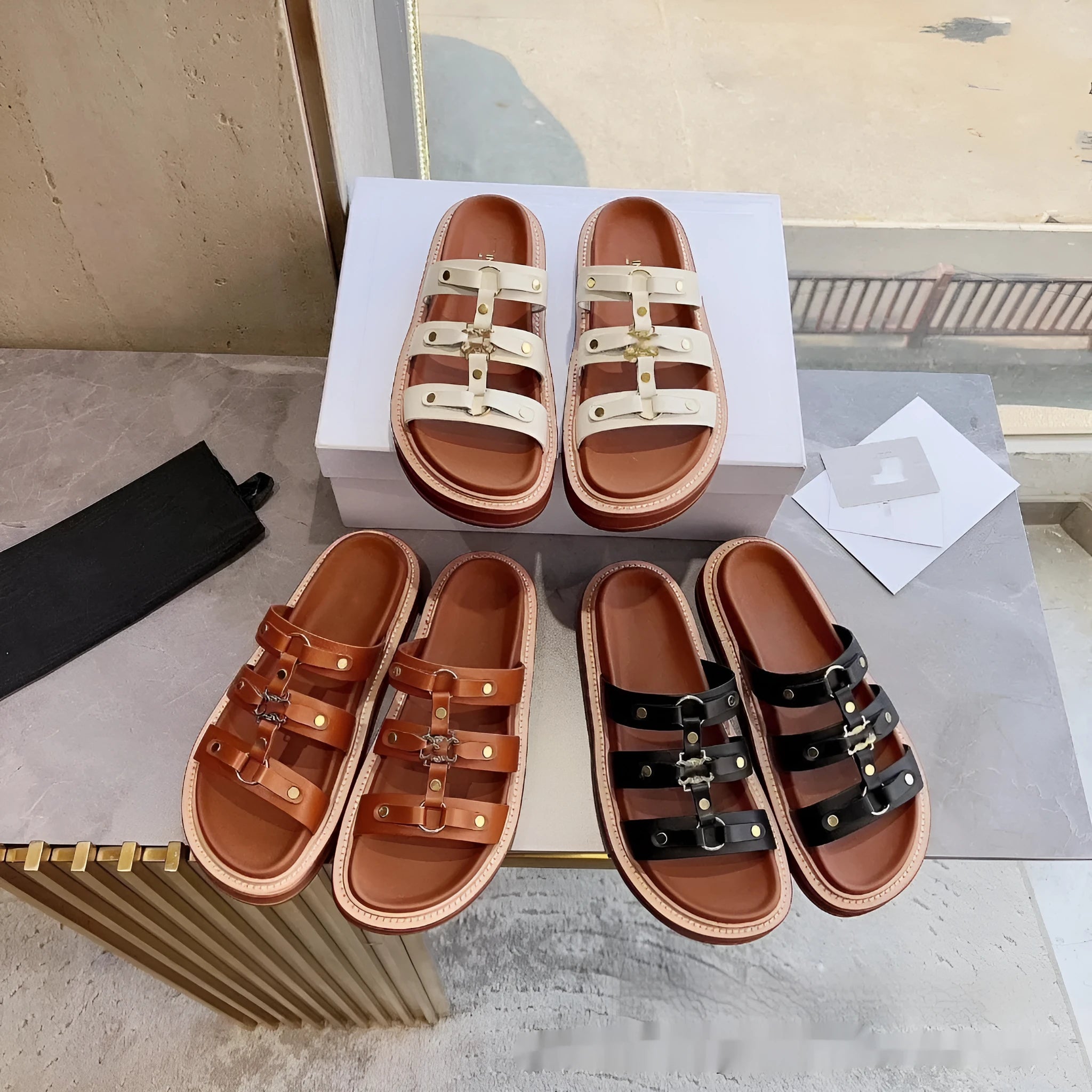 Women's white patent leather Roman sandal slippers with sheepskin upper and ankle strap.