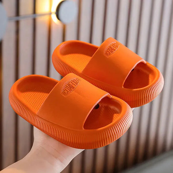Children's EVA slippers with non-slip soles in mixed colour options showing size range
