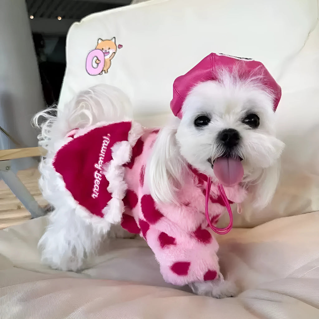 Small dog wearing plush polyester warm coat in British styling, available in pink or brown colour