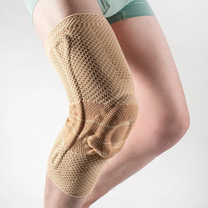 Adult black and blue nylon spandex knee pad for sports protection.
