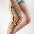 Adult black and blue nylon spandex knee pad for sports protection.