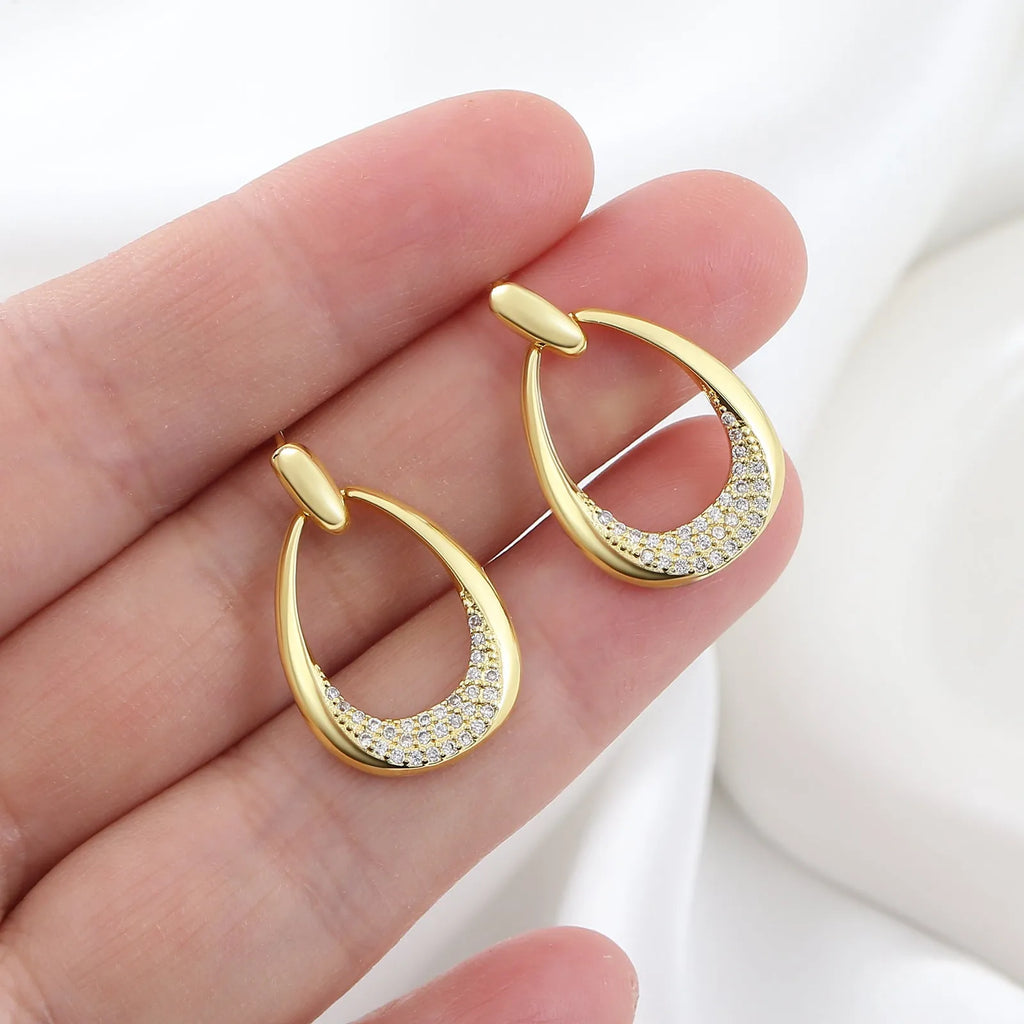 Women's yellow gold geometric drop earrings with zircon detailing measuring 2.6cm by 1.7cm