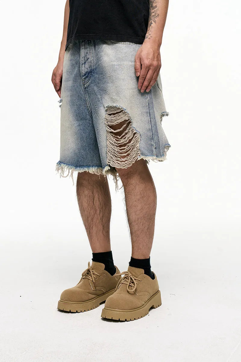 Men's light blue baggy denim shorts with wide leg retro washed design