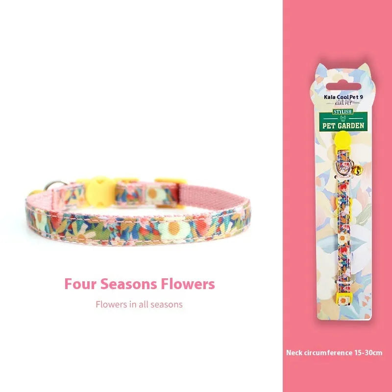 Woven polyester cat collar with anti-suffocation safety buckle and bell in green jungle colour grid pattern