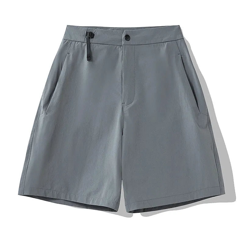 Men's quick-dry athletic shorts in khaki colour with four-way stretch fabric.
