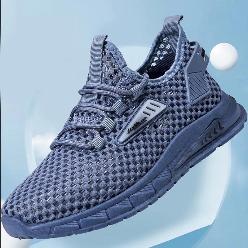Men's beige casual sneaker with synthetic leather upper, mesh lining, and lace-up front.
