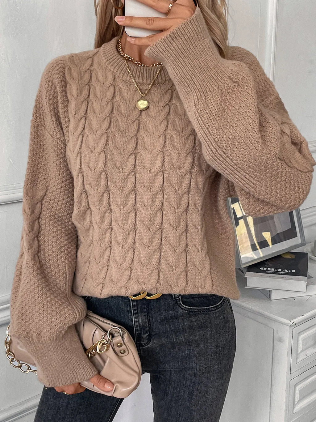 Women's beige loose sweater with twist stitch pattern and round neck